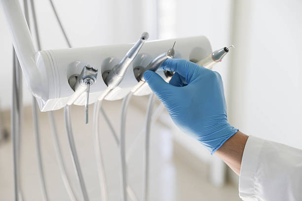 Professional Tooth Extraction technician working in Buna, TX